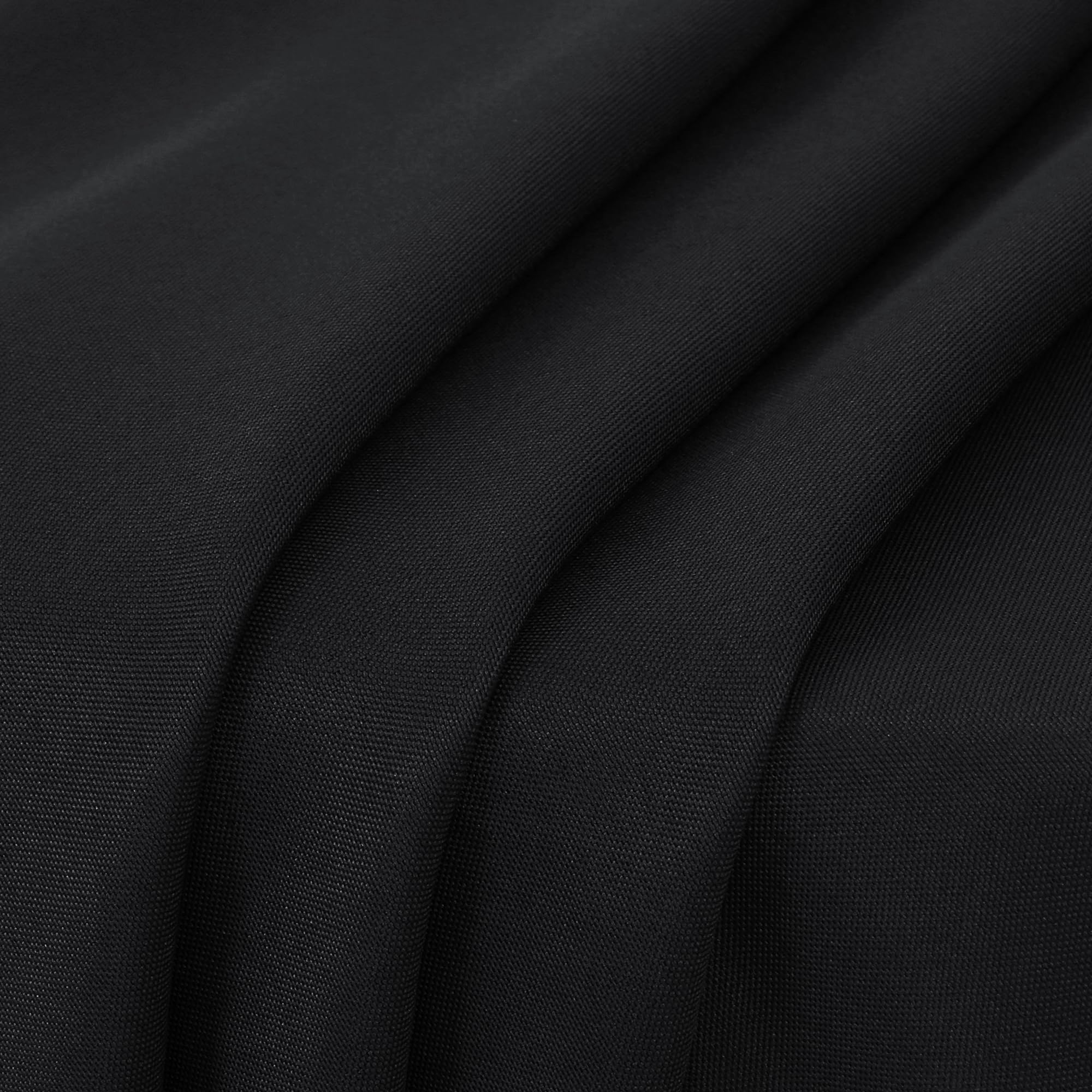 Sancua outdoor dining with black tablecloth, great for gatherings.