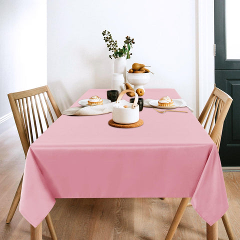 Sancua pink rectangular tablecloth 60x102 draped over a table setting