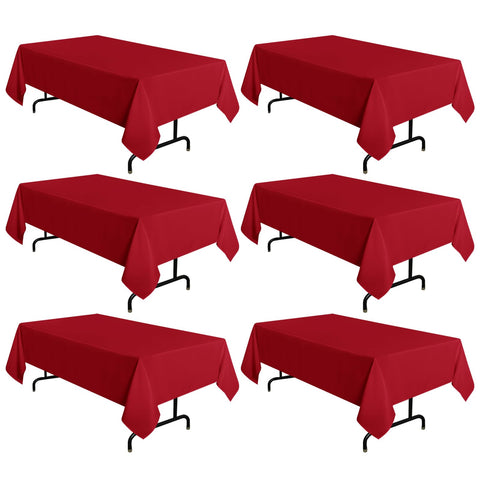 Sancua red tablecloth 60x102 inches on a dining table, offering stain-resistant protection.