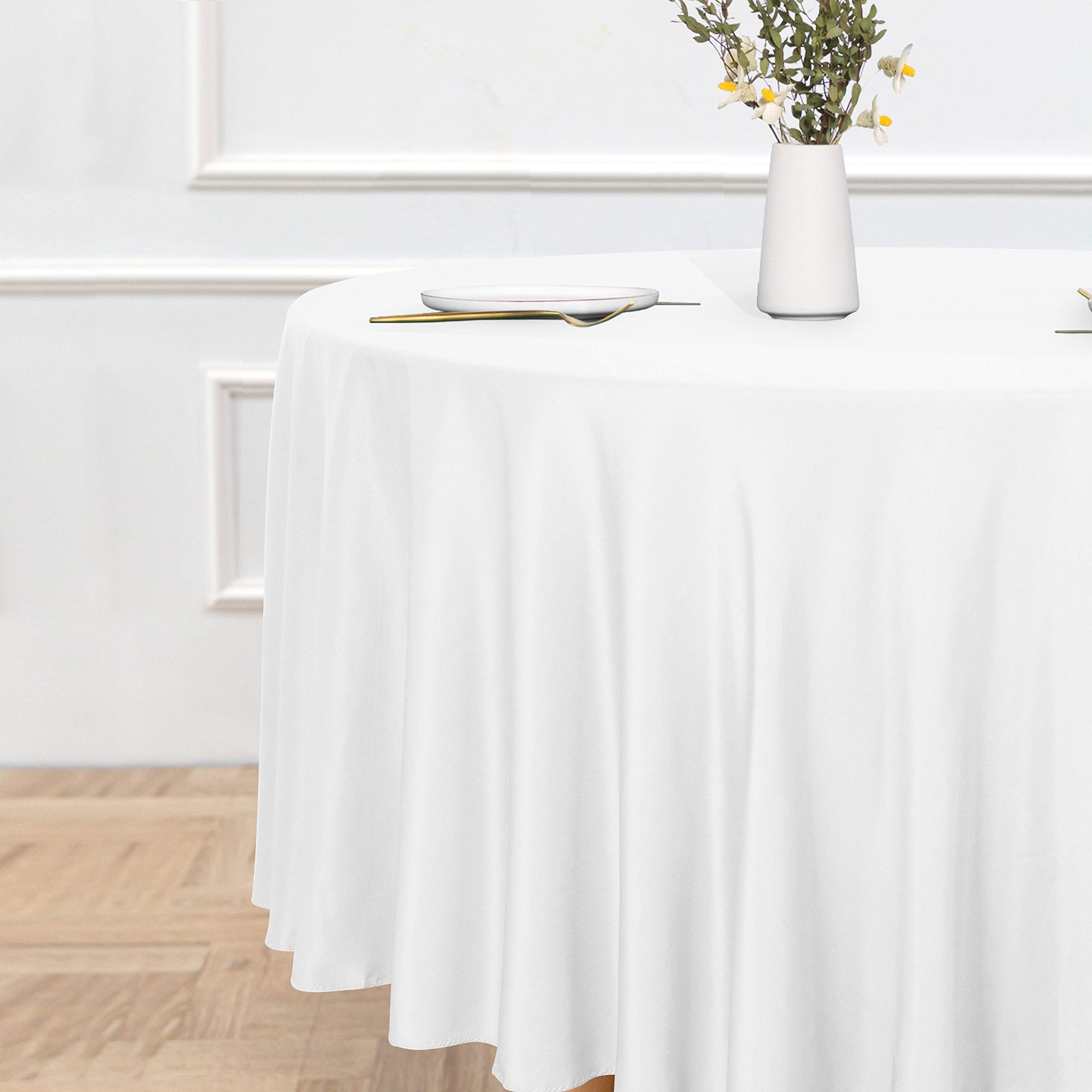 Sancua 108-inch white water-resistant tablecloth ready for outdoor meals.