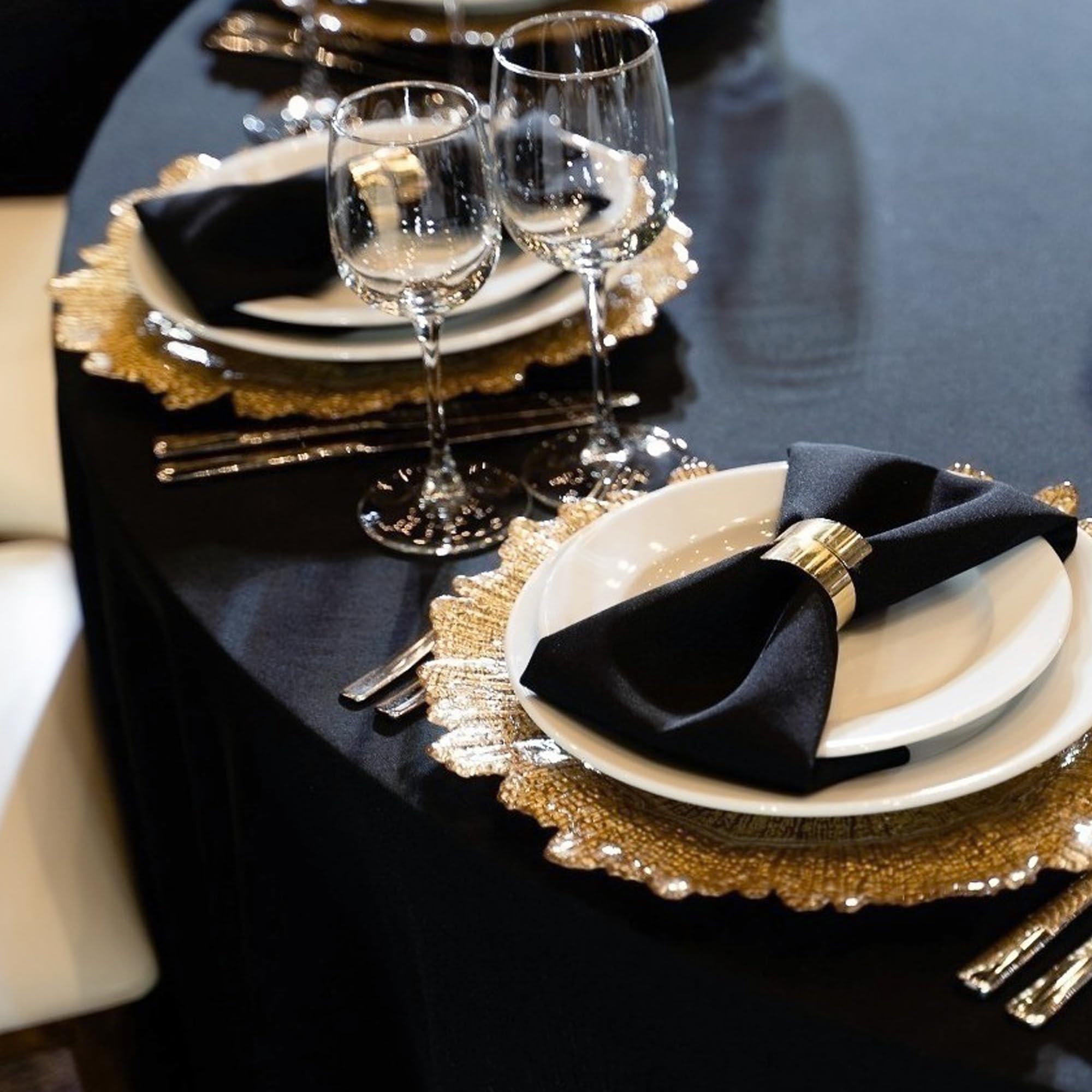 Sancua round tablecloth draped with a 9-inch drop for a polished look.