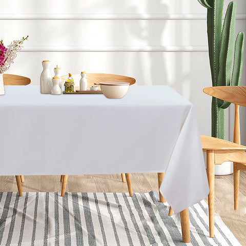 Sancua white tablecloths during a buffet, showing stain resistance for busy event layouts.