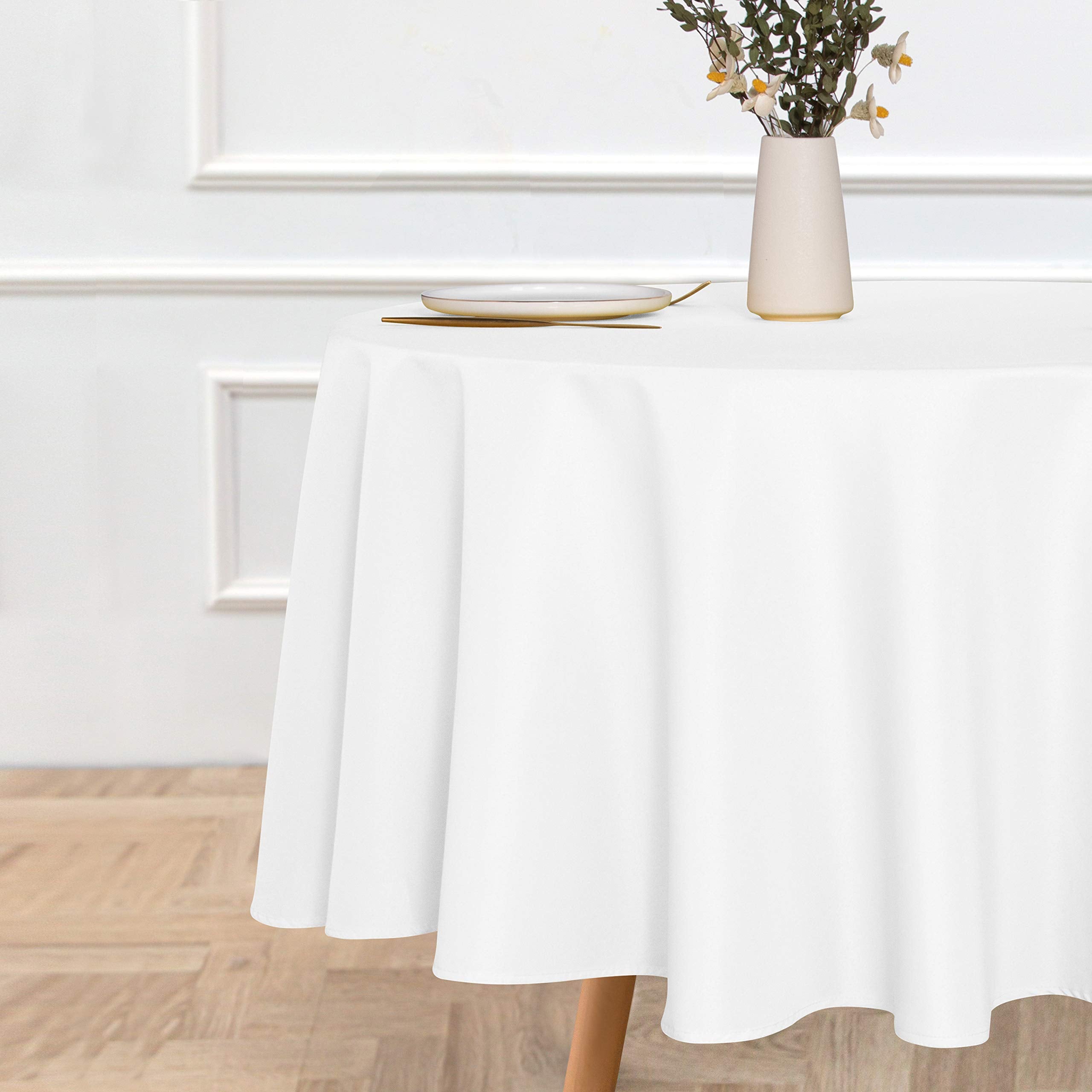 Sancua tablecloth fabric texture closeup showing durable polyester feel.