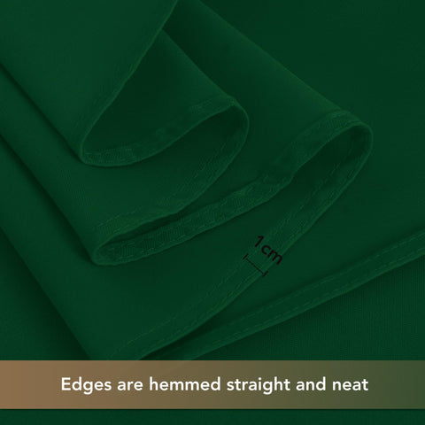 Sancua hunter green tablecloth on wedding reception setup.