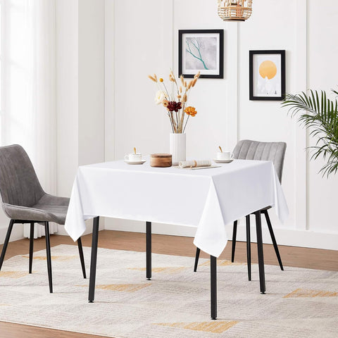 Sancua white square tablecloth 60x60 on dining table with settings.