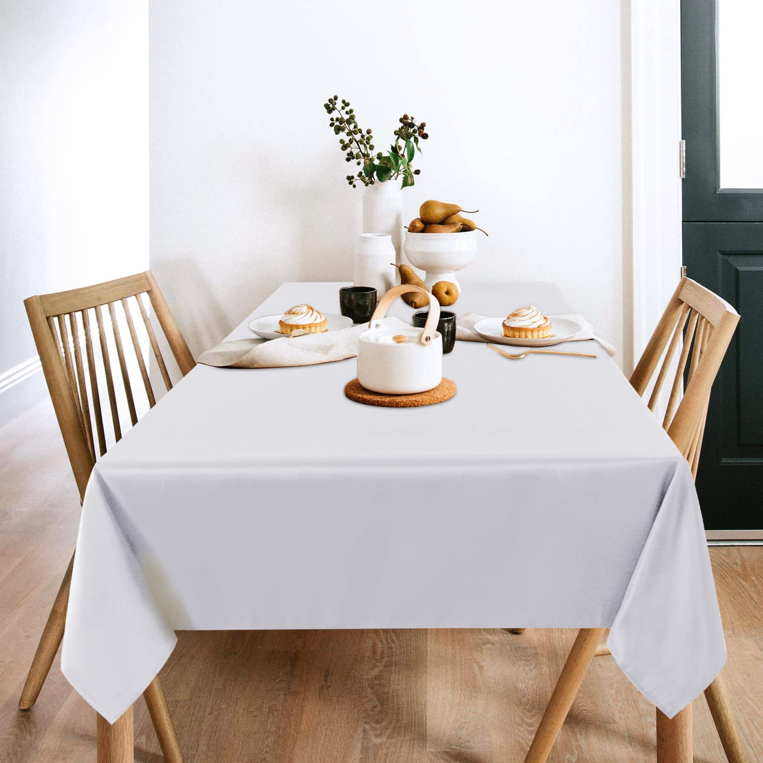 Sancua white tablecloth draped on a 4ft table showing smooth drape