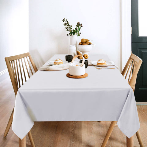 Sancua white tablecloth draped on a 4ft table showing smooth drape