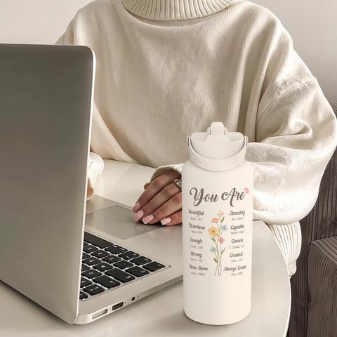SANDJEST active life bottle in gym or outdoor scene, ready for hydration on adventures.
