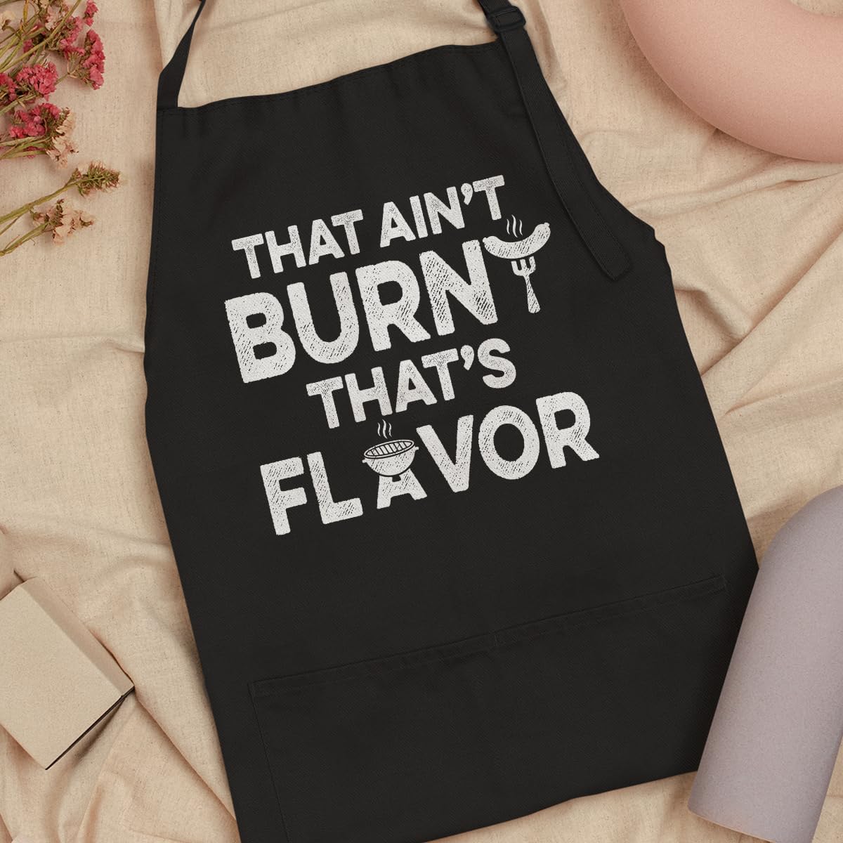 SANDJEST durable apron in use during grilling and prep.