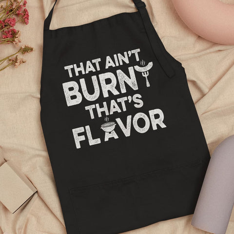 SANDJEST durable apron in use during grilling and prep.