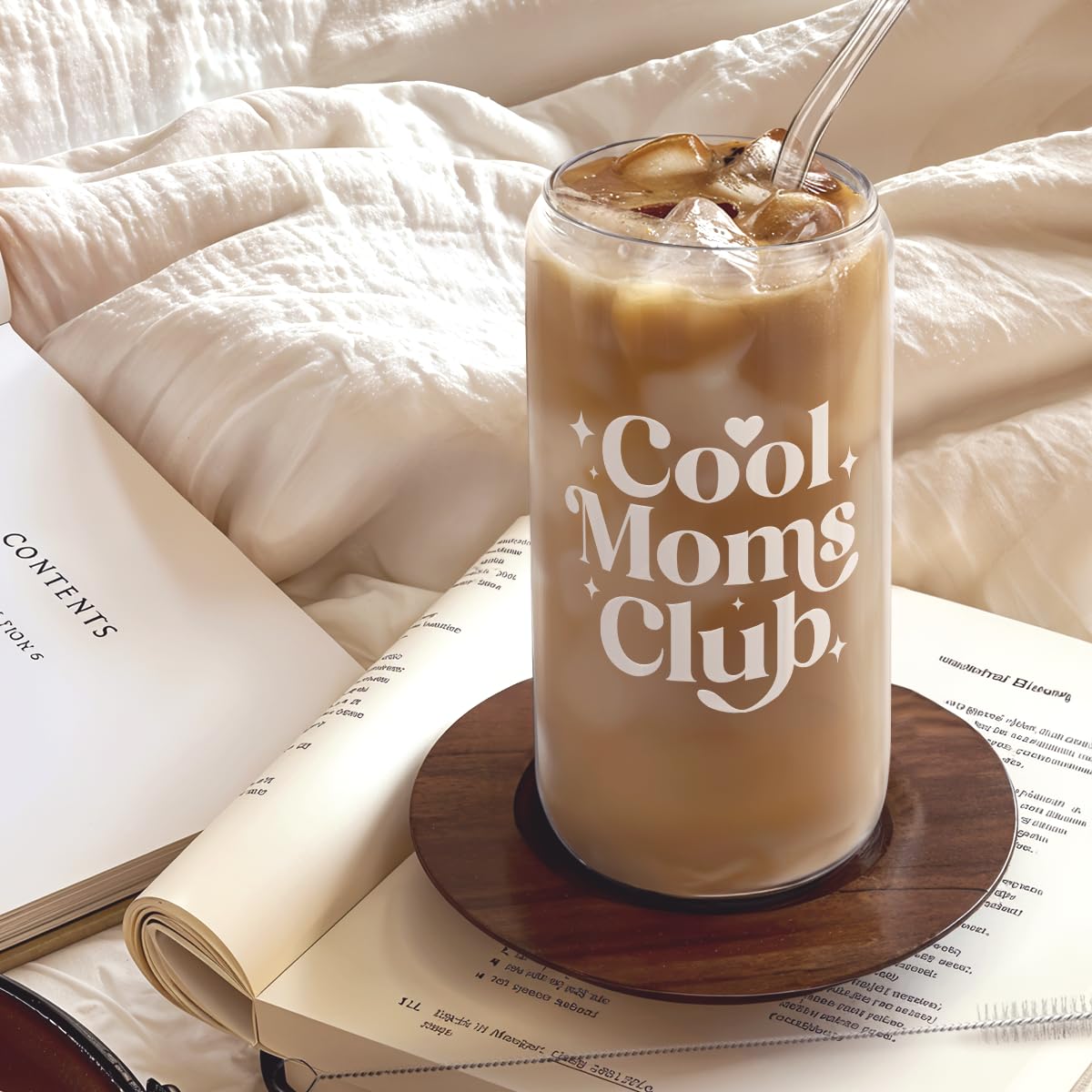 Sandjest bamboo lid glass cup with straw ideal for sustainable beverages.
