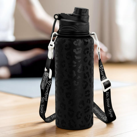 Sandjest leopard skin bottle close-up highlights durable stainless steel finish