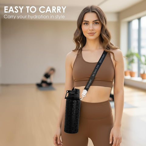 Sandjest bottle with adjustable strap for hands-free carrying during activities