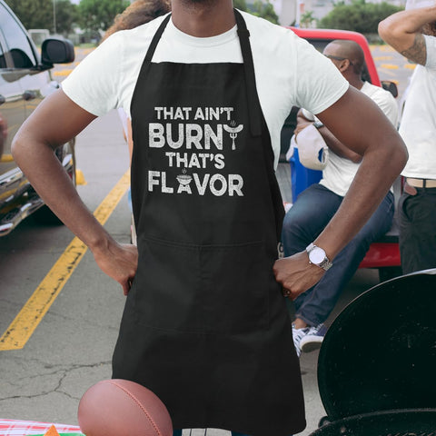 SANDJEST apron on a man cooking, practical and comfortable.