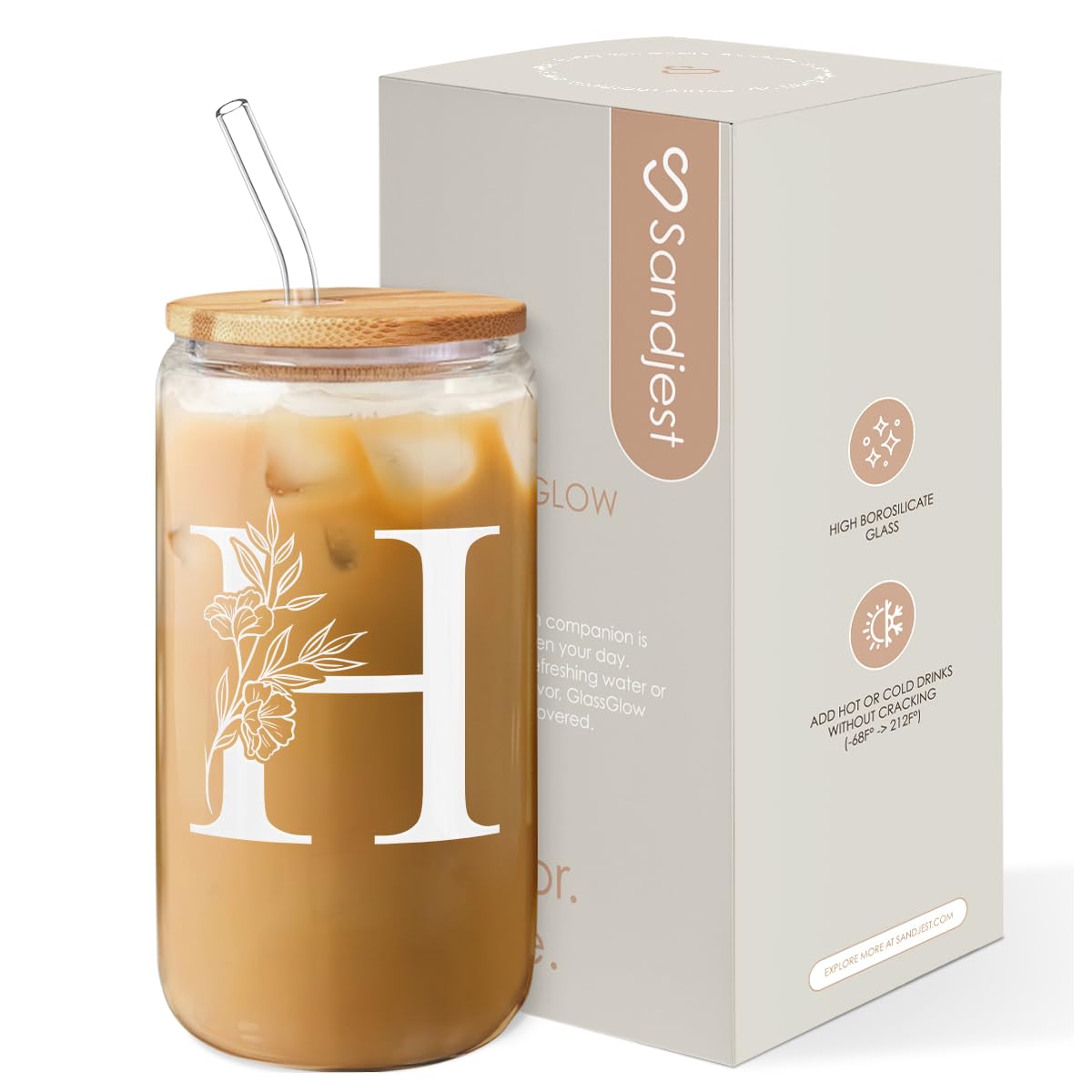Sandjest monogram H glass cup with lid and straw, ideal for stylish iced coffee on the go.