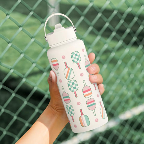 SANDJEST pickleball bottle on court during a rally