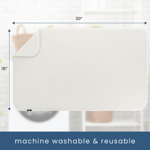 S&T INC. 18x30 cream mat used under cookware protects surfaces during meal prep.