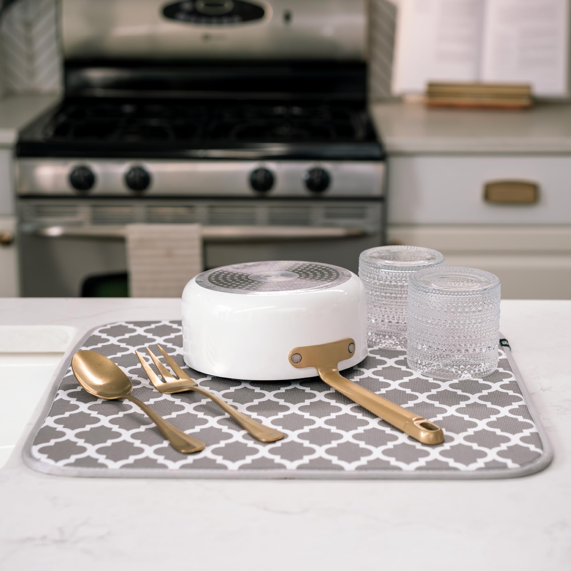 S&T INC. Dish Drying Mat cushions delicate glassware on the counter.