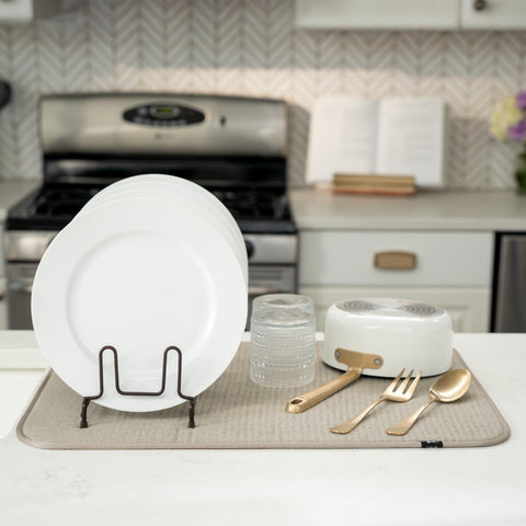 S&T INC. Drip-catching mat placed beside the sink catches water.