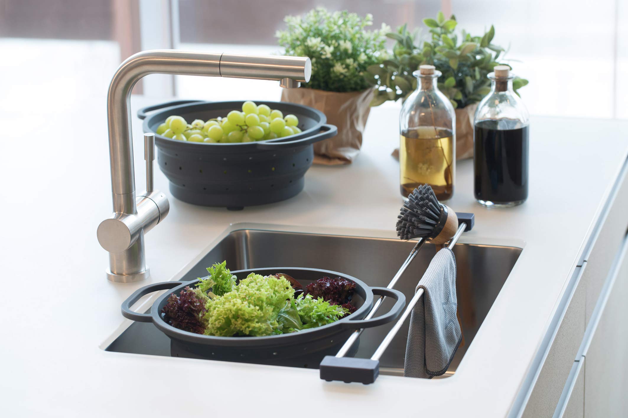 Sanni Shoo DripLine Pure dishcloth-brush holder helps keep counters organized.