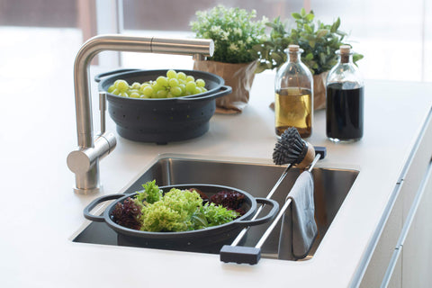 Sanni Shoo DripLine Pure dishcloth-brush holder helps keep counters organized.