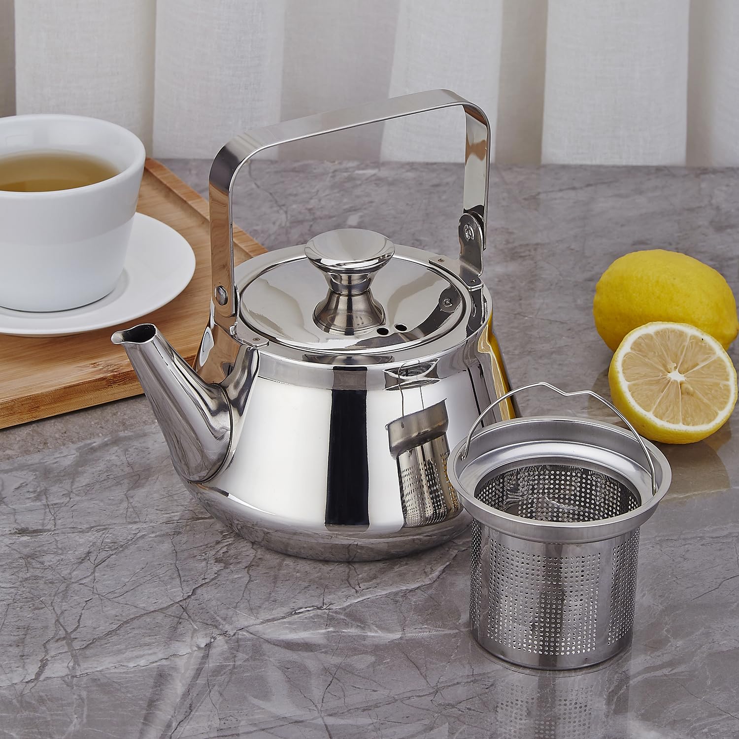 Close-up of SANQIAHOME tea infuser for flavorful brews.
