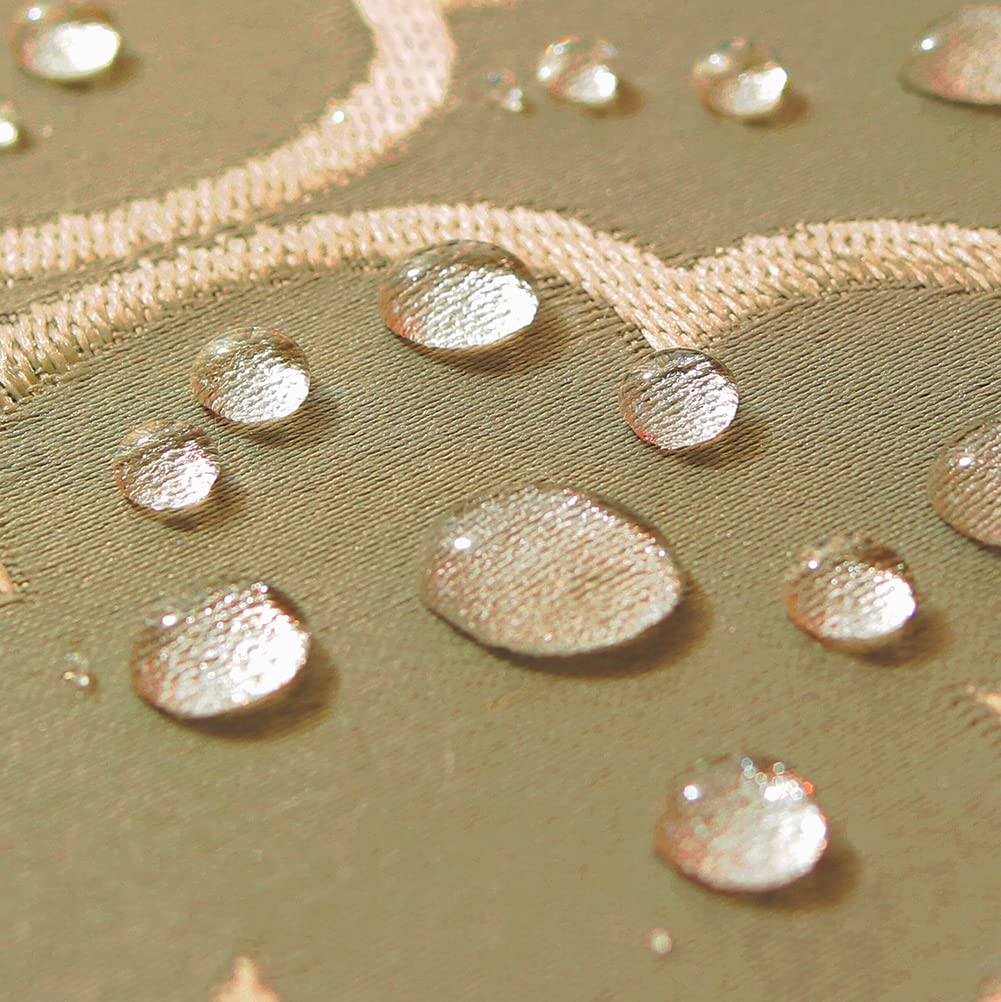 SASTYBALE jacquard tablecloth easy-clean feature demonstrated with damp cloth.