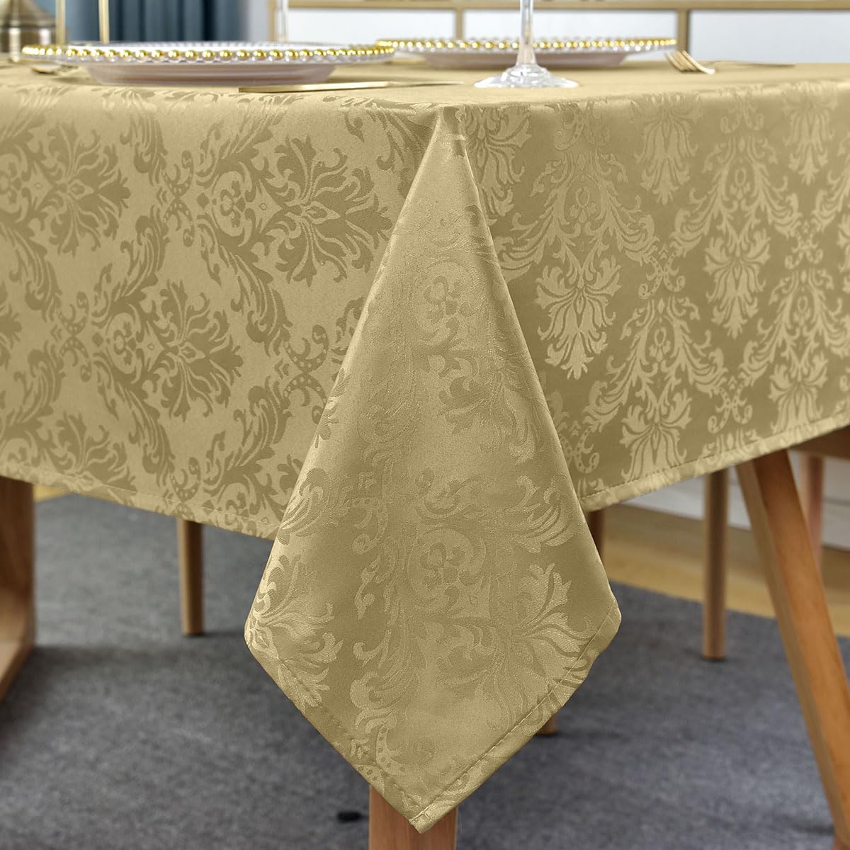 SASTYBALE jacquard tablecloth in gold on a rectangle table enhances dining ambiance