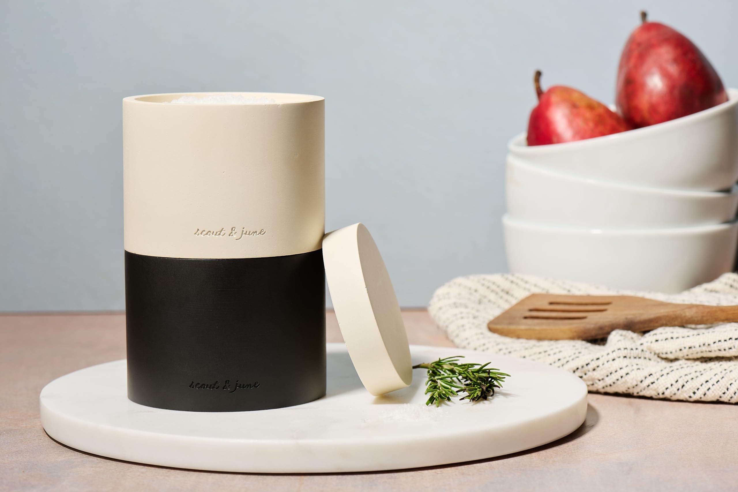 Countertop-ready spice container designed for sea salt and pepper.