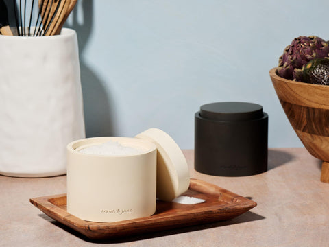 Scout & June stackable salt and pepper bowls save counter space with secure lids.