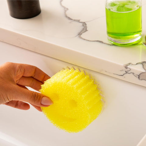 Scrub Daddy slimline clear caddy minimizes clutter while keeping sponges accessible.