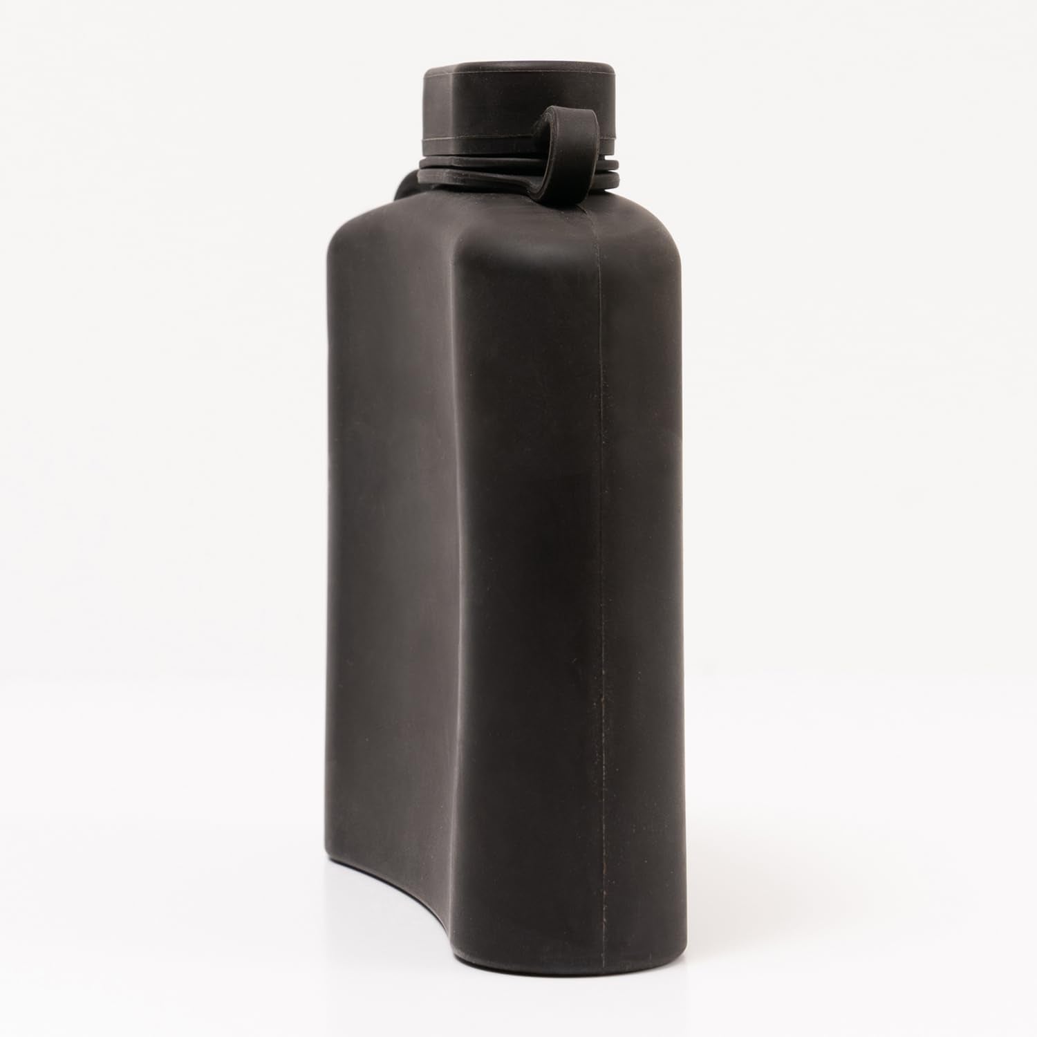 Secret Swig hip flask tucked in a pocket for discreet portability