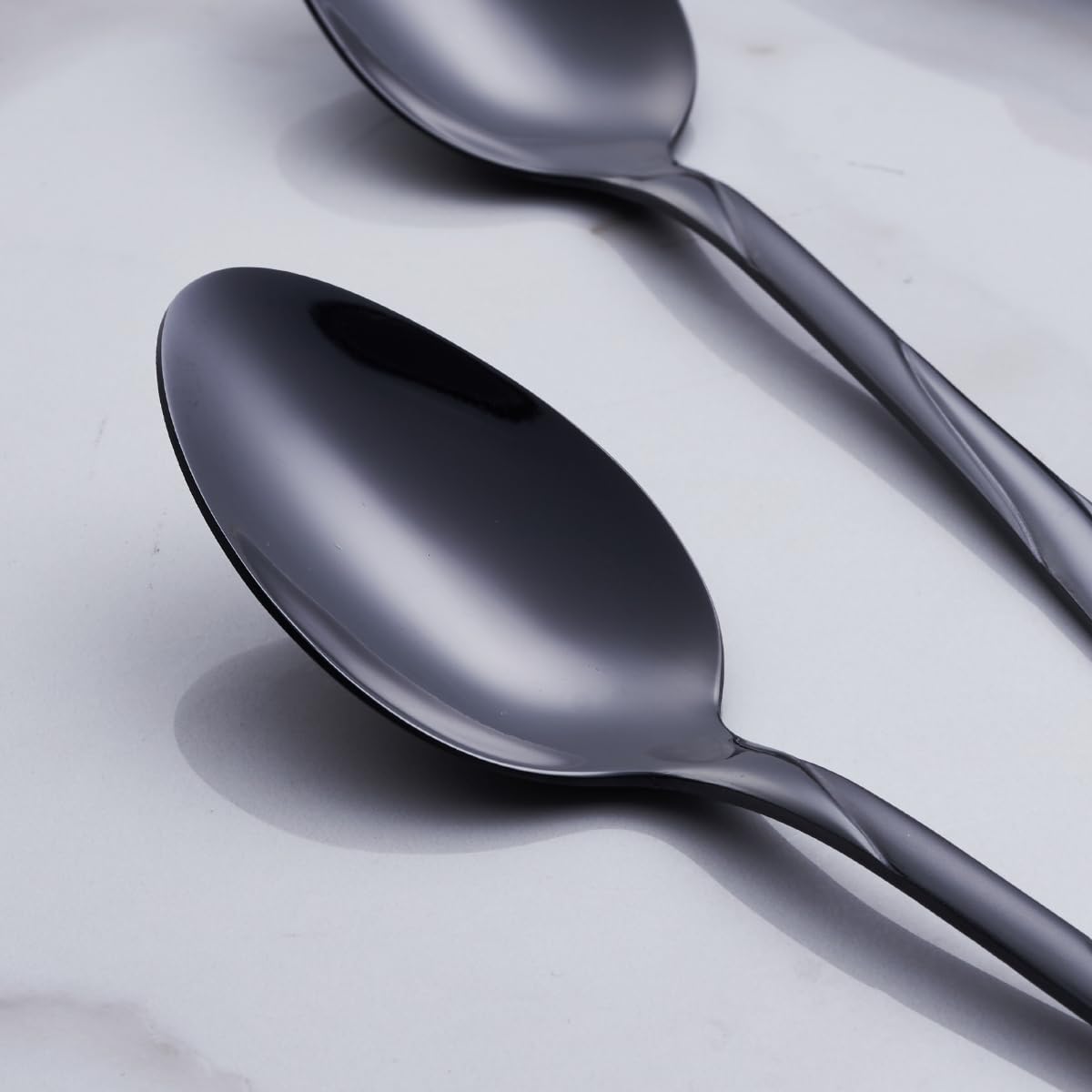 Seeshine black silverware set with mirror finish elevates any table setting.