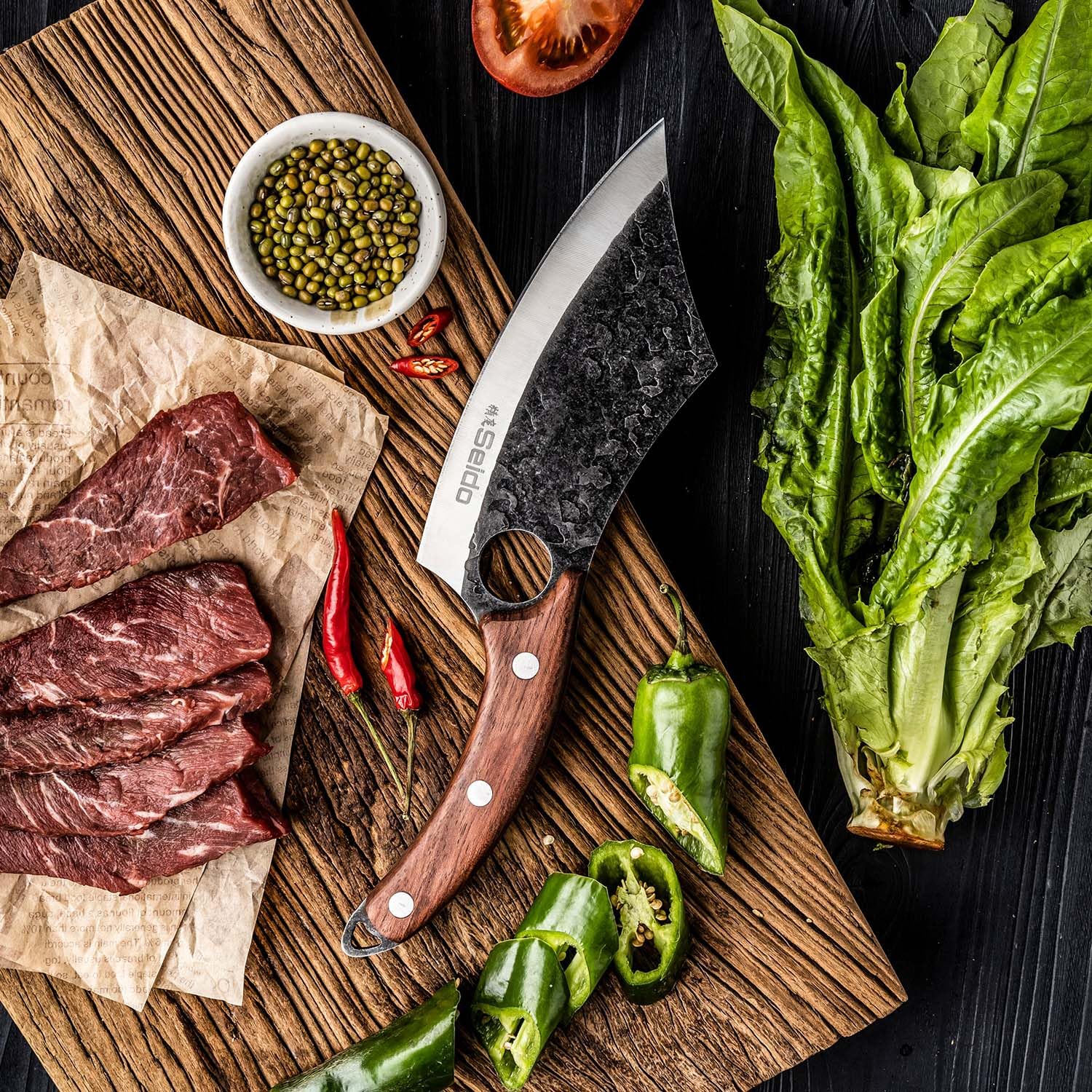 Seido Knives Hakai meat prep scene for versatile protein slicing and dicing.