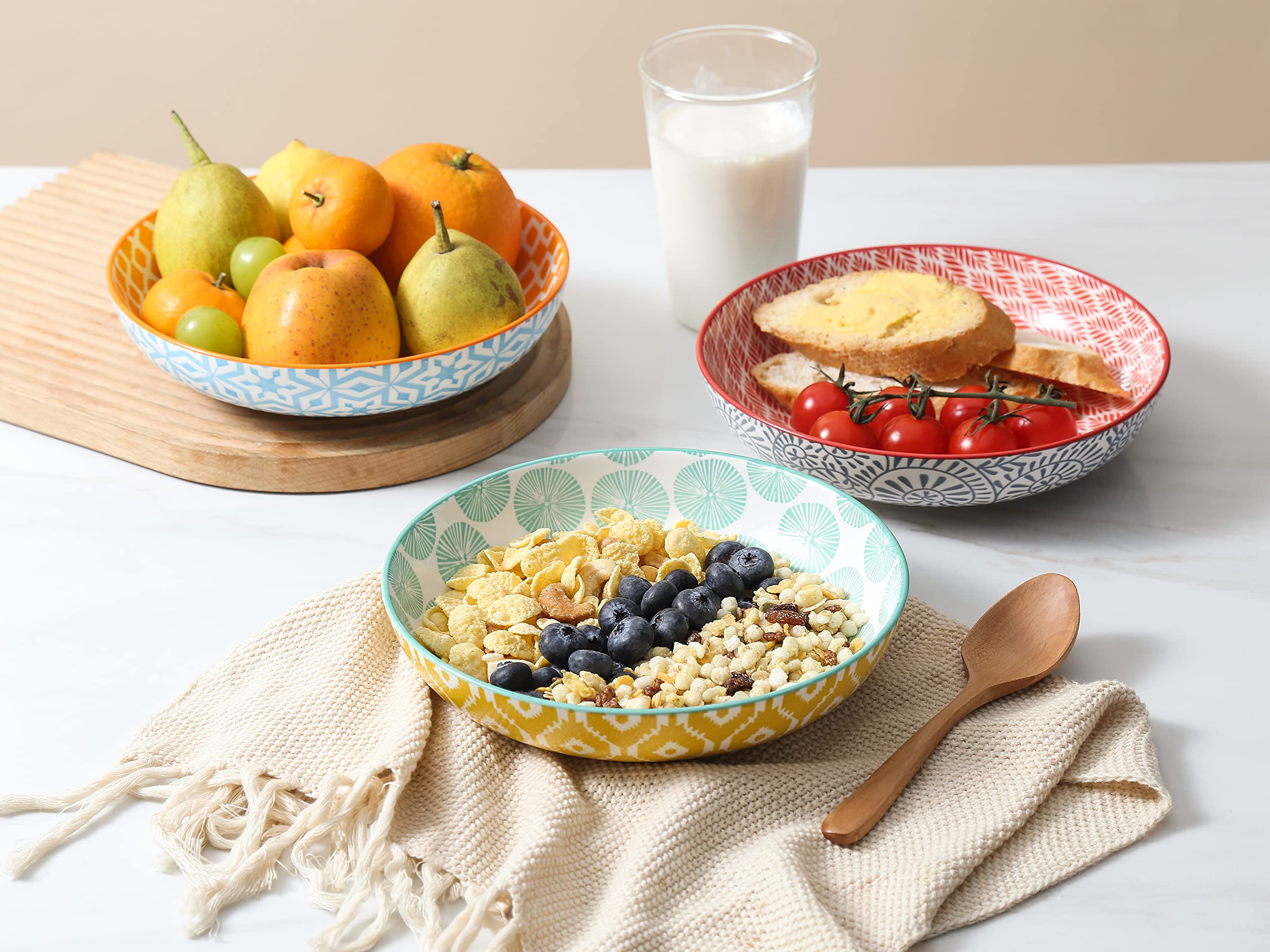 Selamica bowls with vivid pattern inside and outside adding color to meals.
