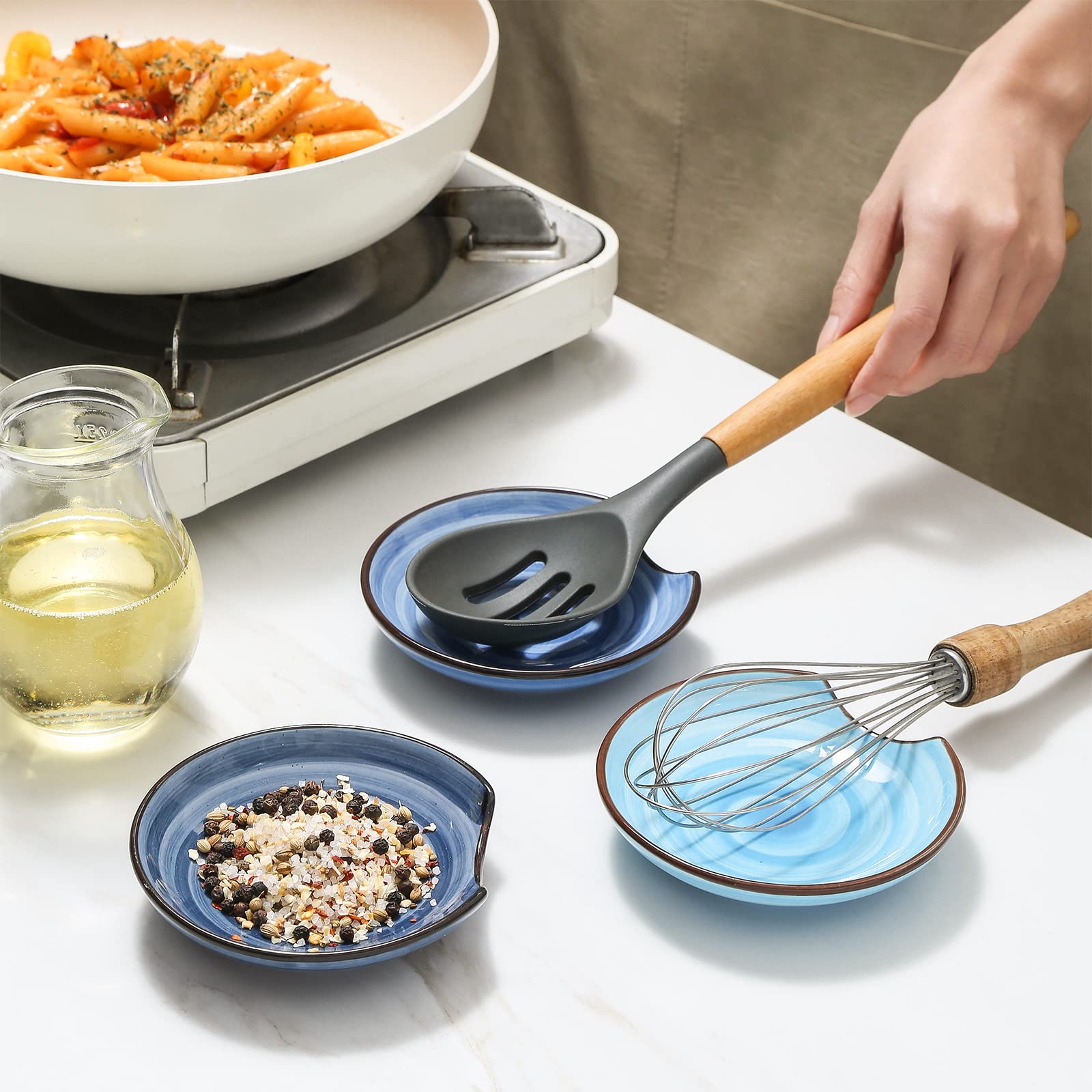 Selamica heat resistant spoon rest withstands stovetop heat safely.