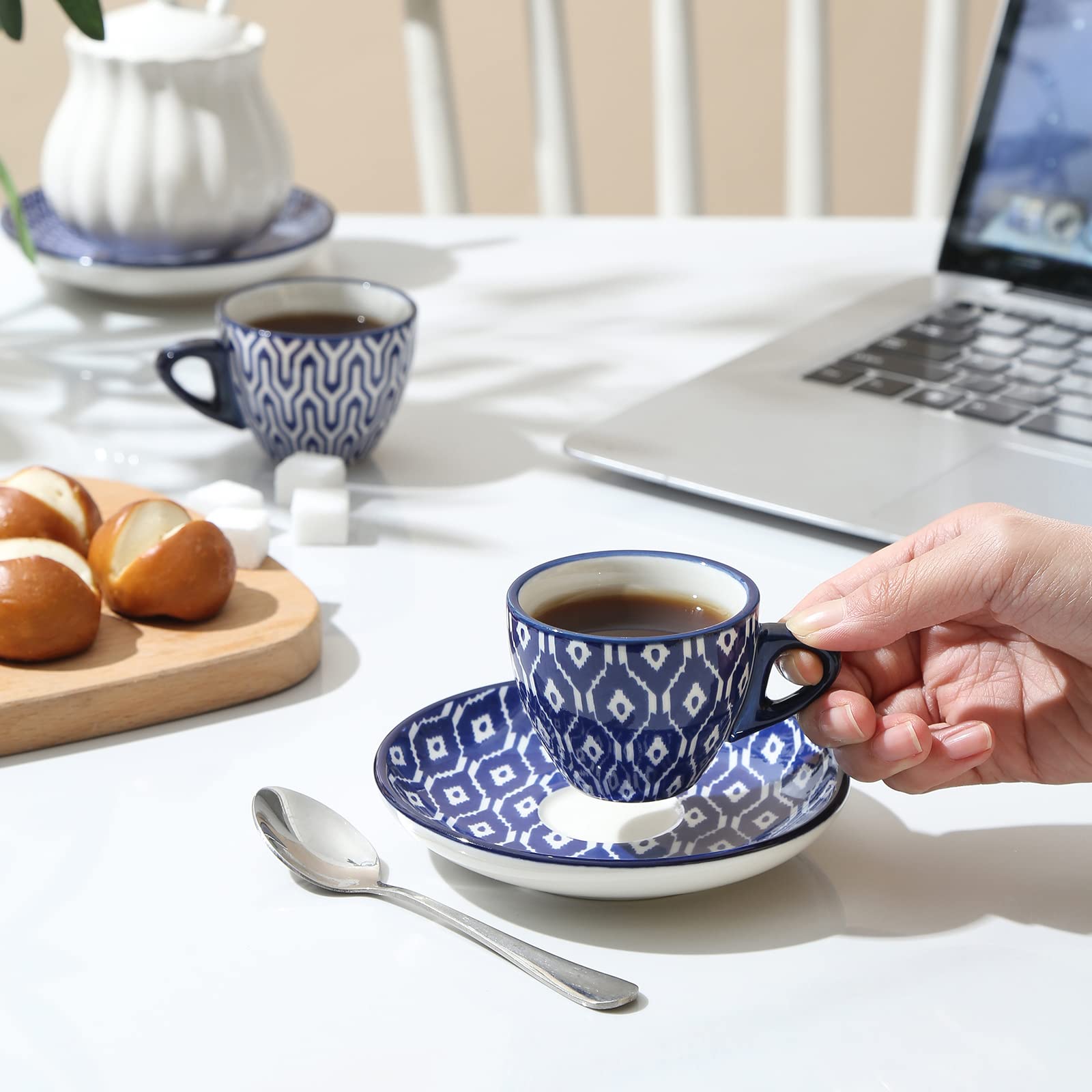 Selamica demitasse cups with saucers showcase a coordinated set ideal for elegant coffee service.