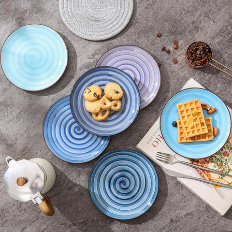 Selamica gradient blue porcelain plate detail highlighting raised edge for sauce containment.