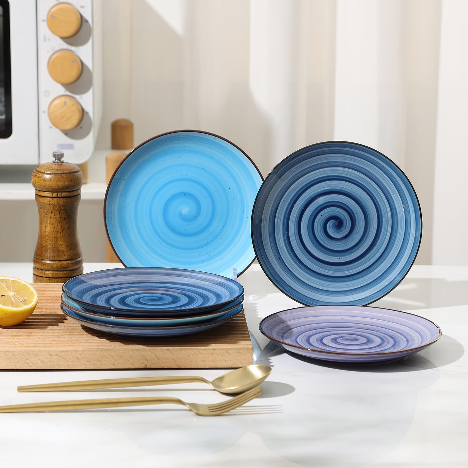 Selamica gradient blue stackable plate demonstrates space-saving design.