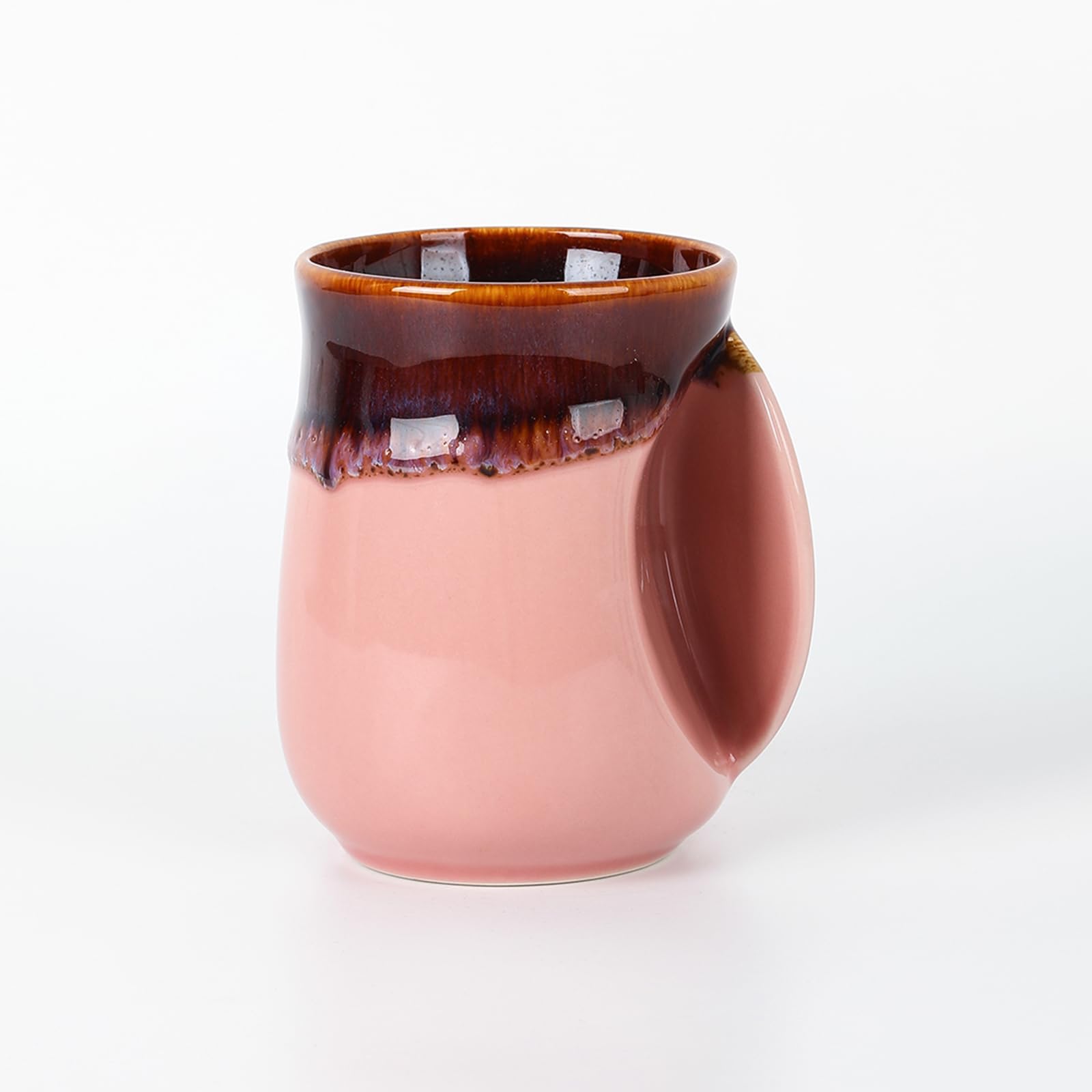 Selamica porcelain 18oz mug with ergonomic hand warmer pocket for comforting warmth.