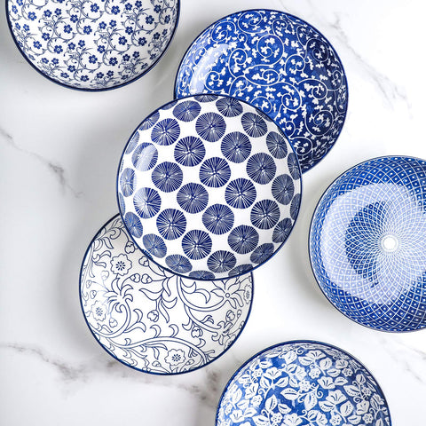 Selamica stackable display of bowls keeps cabinets organized.