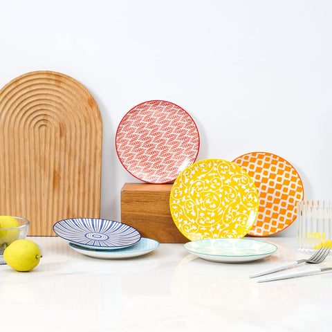 Selamica raised-edge plate contains sauces neatly.