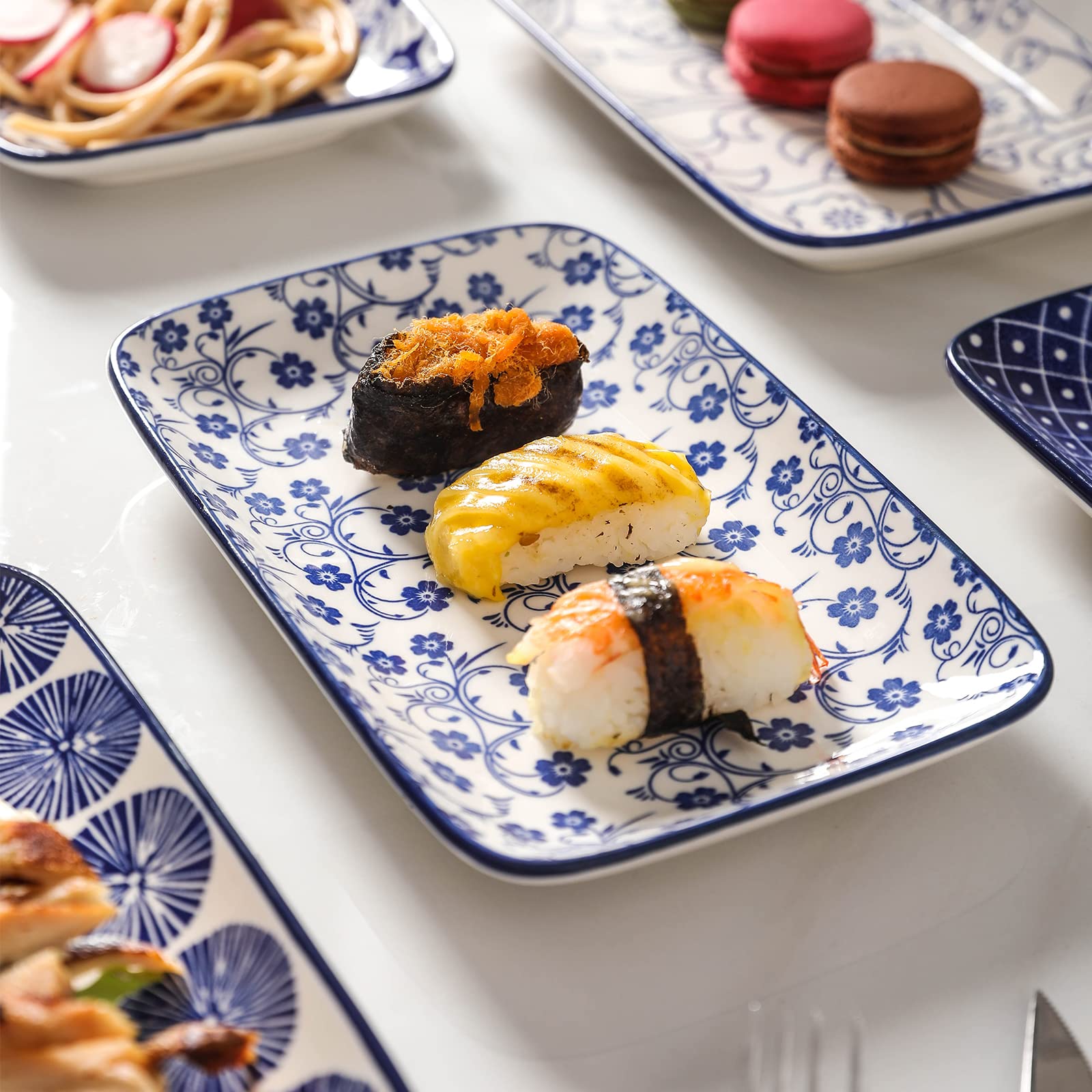 Selamica stack of blue rectangular plates saving cabinet space.