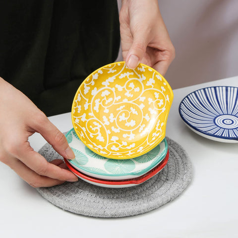 Selamica spoon rest with round depression cradles spoons and spatulas without spills