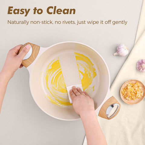 SENSARTE ceramic pots and pans set included utensils for easy cooking and cleanup.