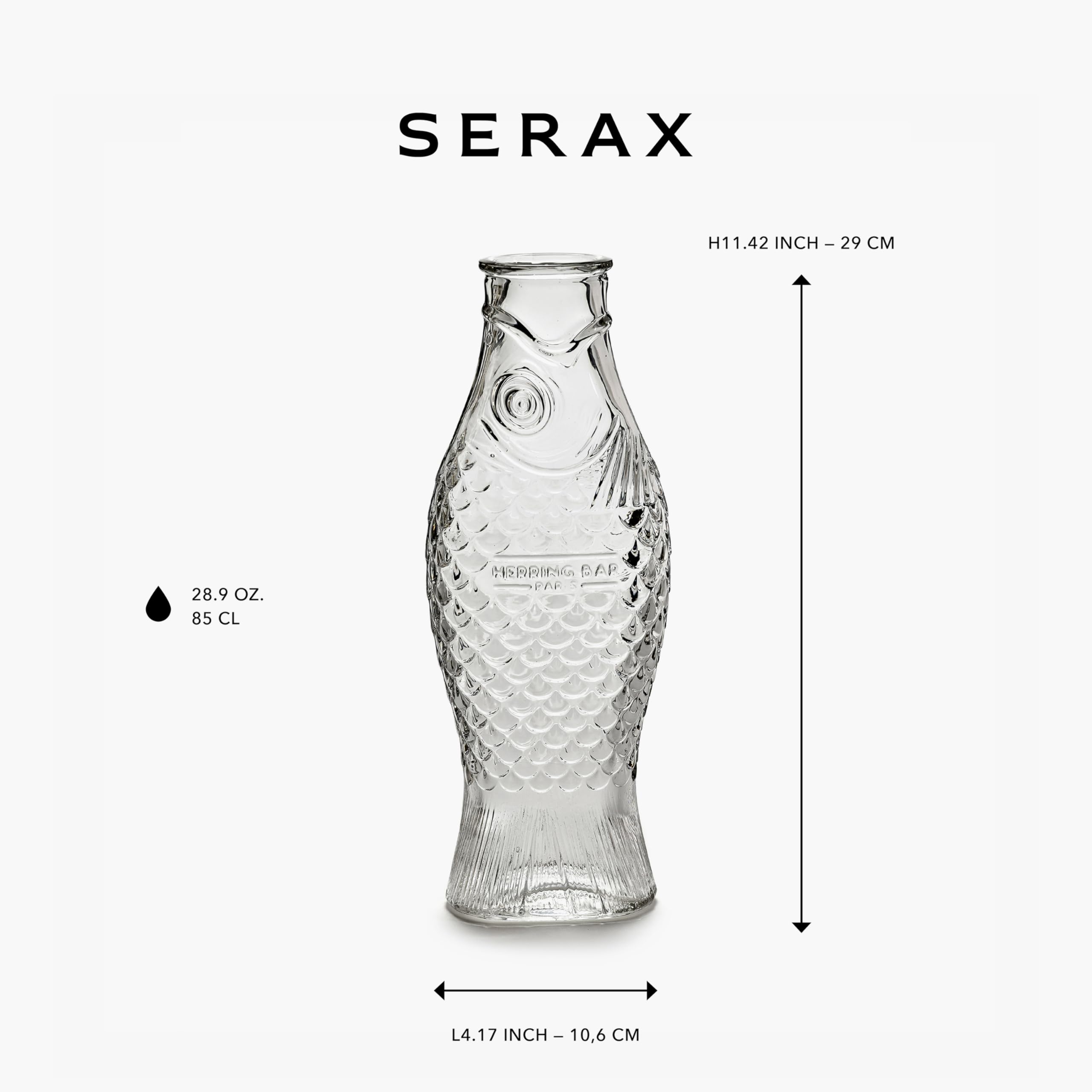 Serax water pitcher from Fish & Fish collection, sleek Paola Navone design at the table.