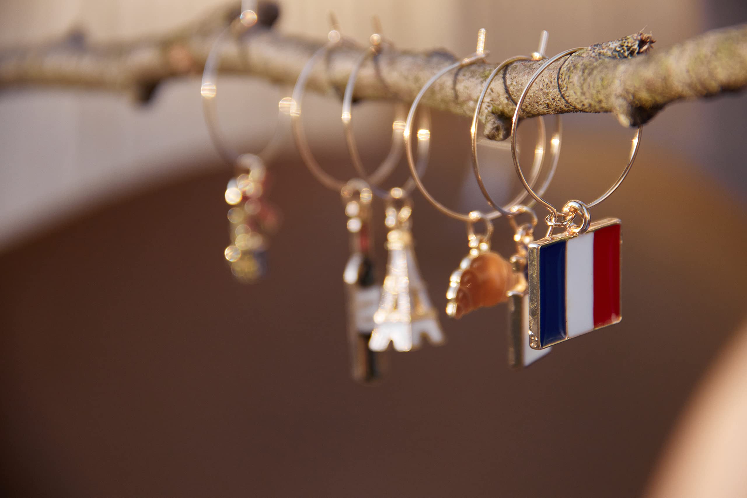 Serendipity France wine glass charms featuring a croissant for a playful, themed tasting.