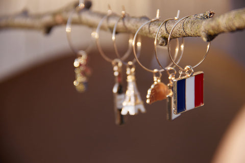 Serendipity France wine glass charms featuring a croissant for a playful, themed tasting.