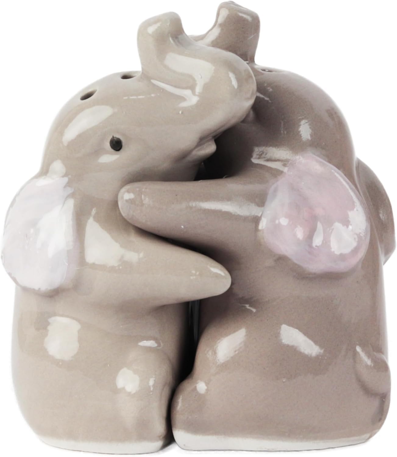 Servette Home hugging elephants salt and pepper shakers on a kitchen counter for daily use.