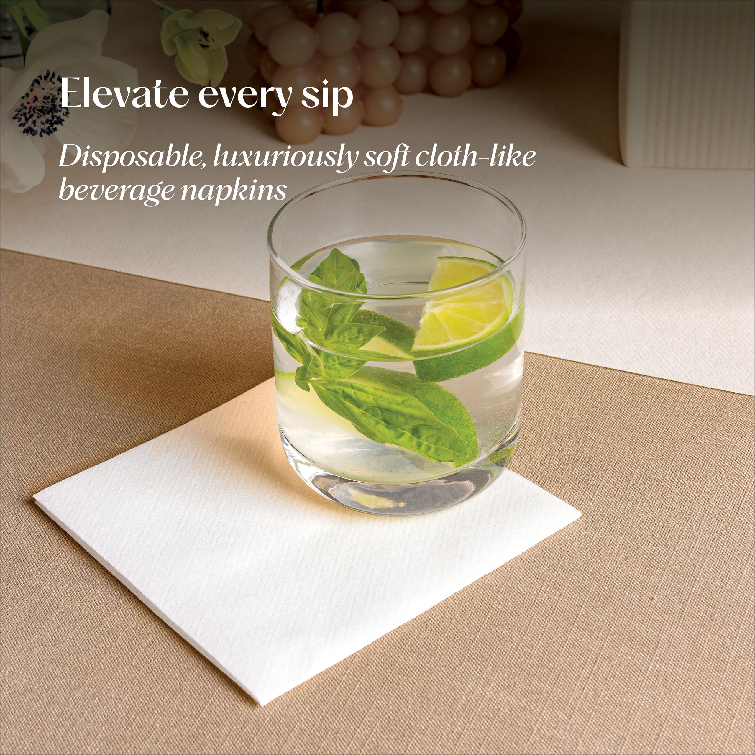 Servietto 200 linen-feel napkins folded to 5x5 inches, compact table accent.